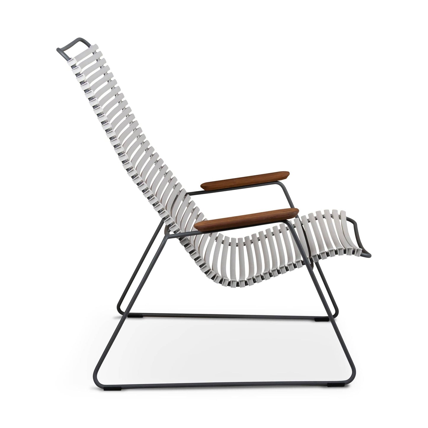 Lounge chair with white straps and wooden armrests.