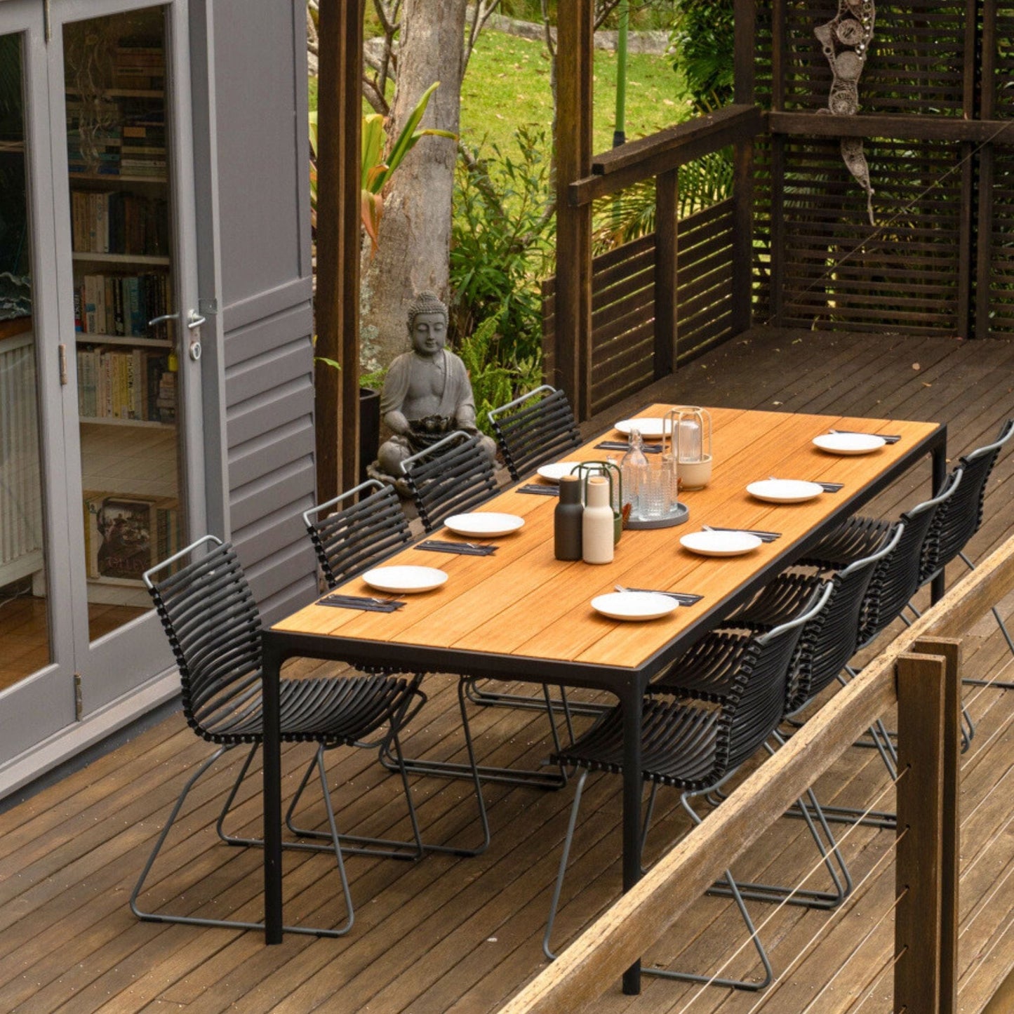 Four-table dining set on wooden deck