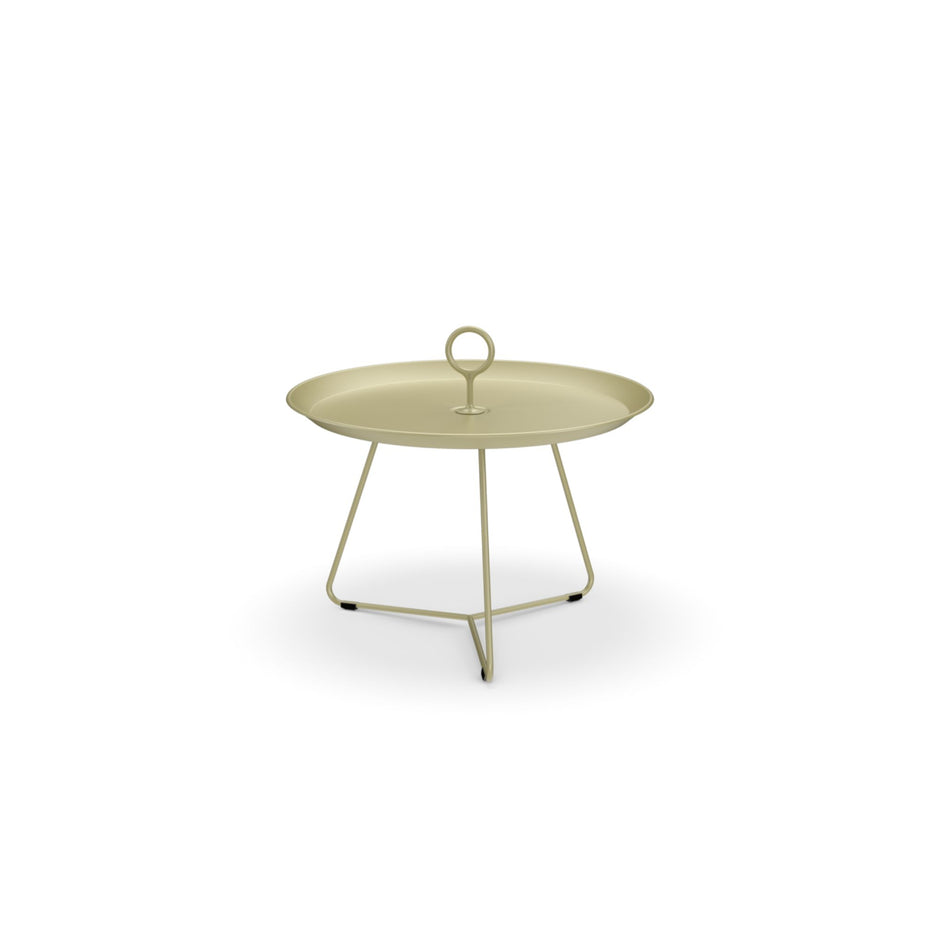 Tan round side table with handle.