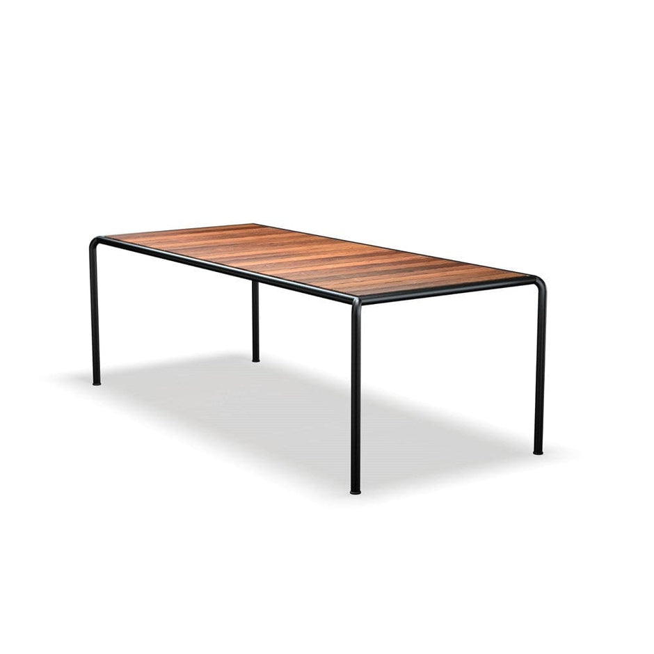 Rectangular table with wooden top and black legs.