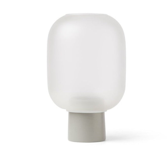 Frosted glass lamp with gray base.