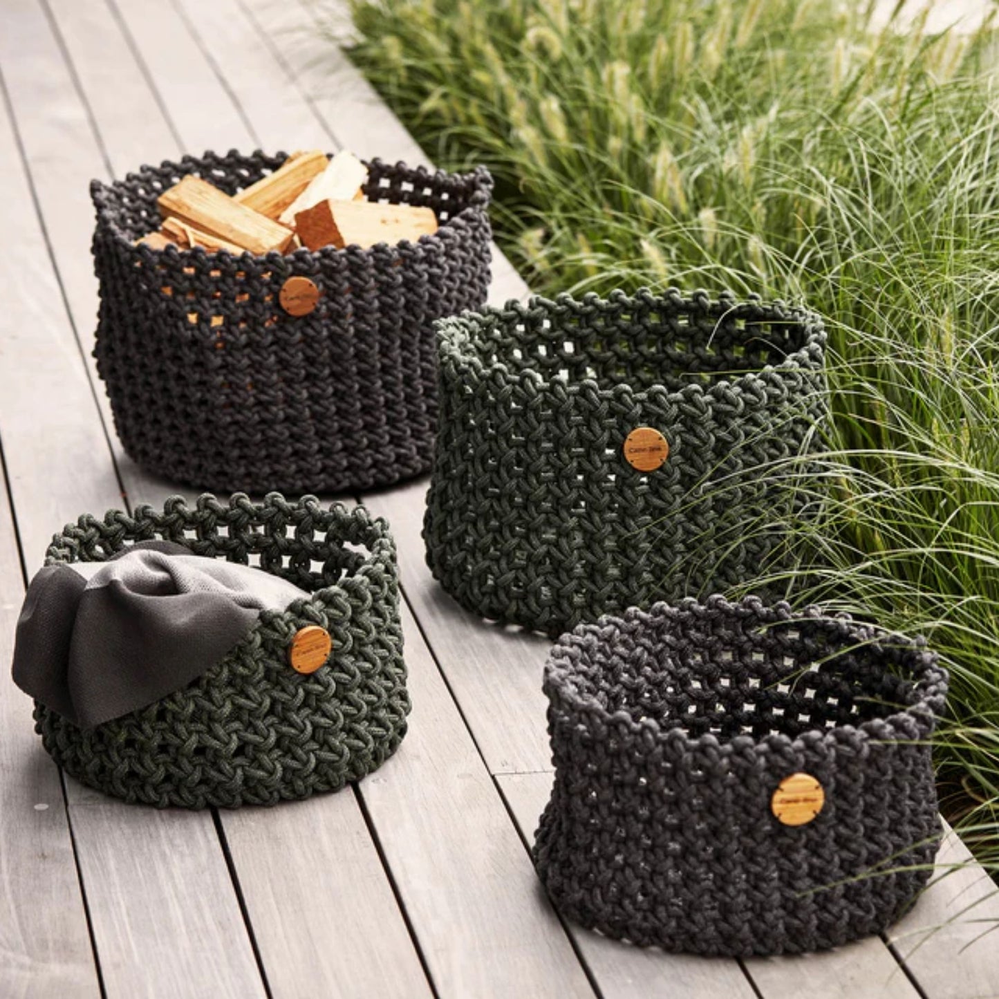 Set of four woven storage baskets
