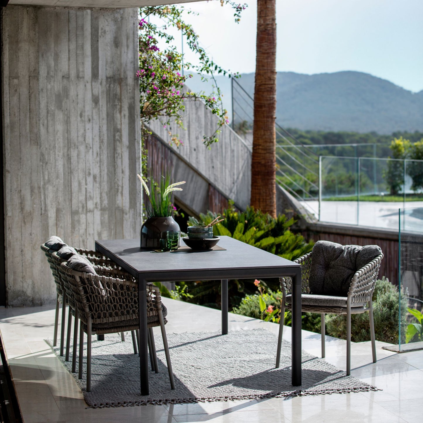 Outdoor dining set 5417ROT_4 with modern patio furniture and mountain views