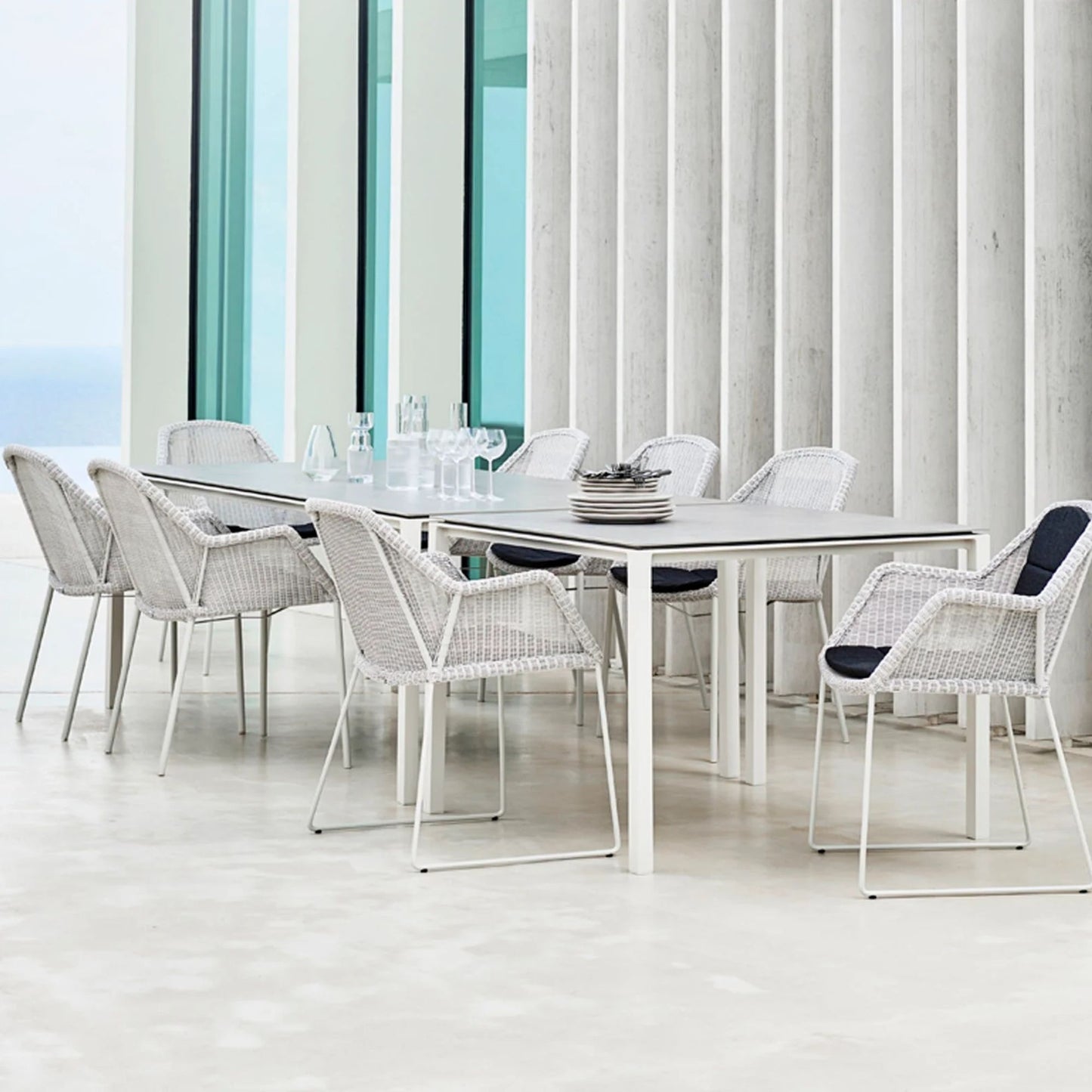 5467LW_2 outdoor dining set with white wicker chairs