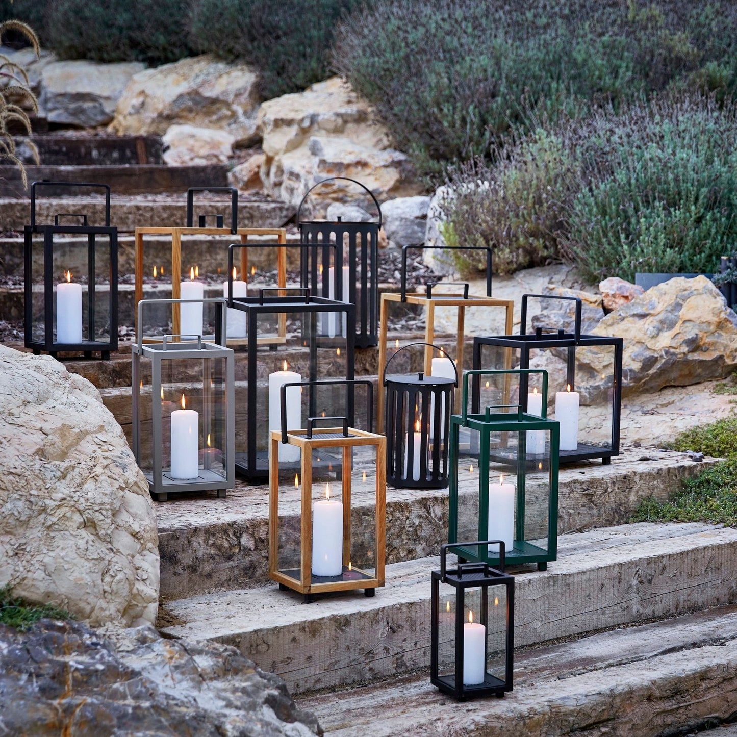 Outdoor candle lanterns on stone steps
