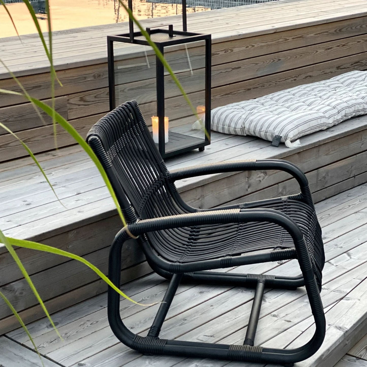 Outdoor black chair on wooden deck - 57402ALG_5