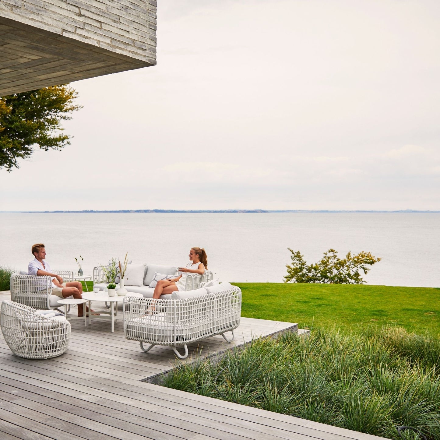 Outdoor wicker furniture set overlooking water