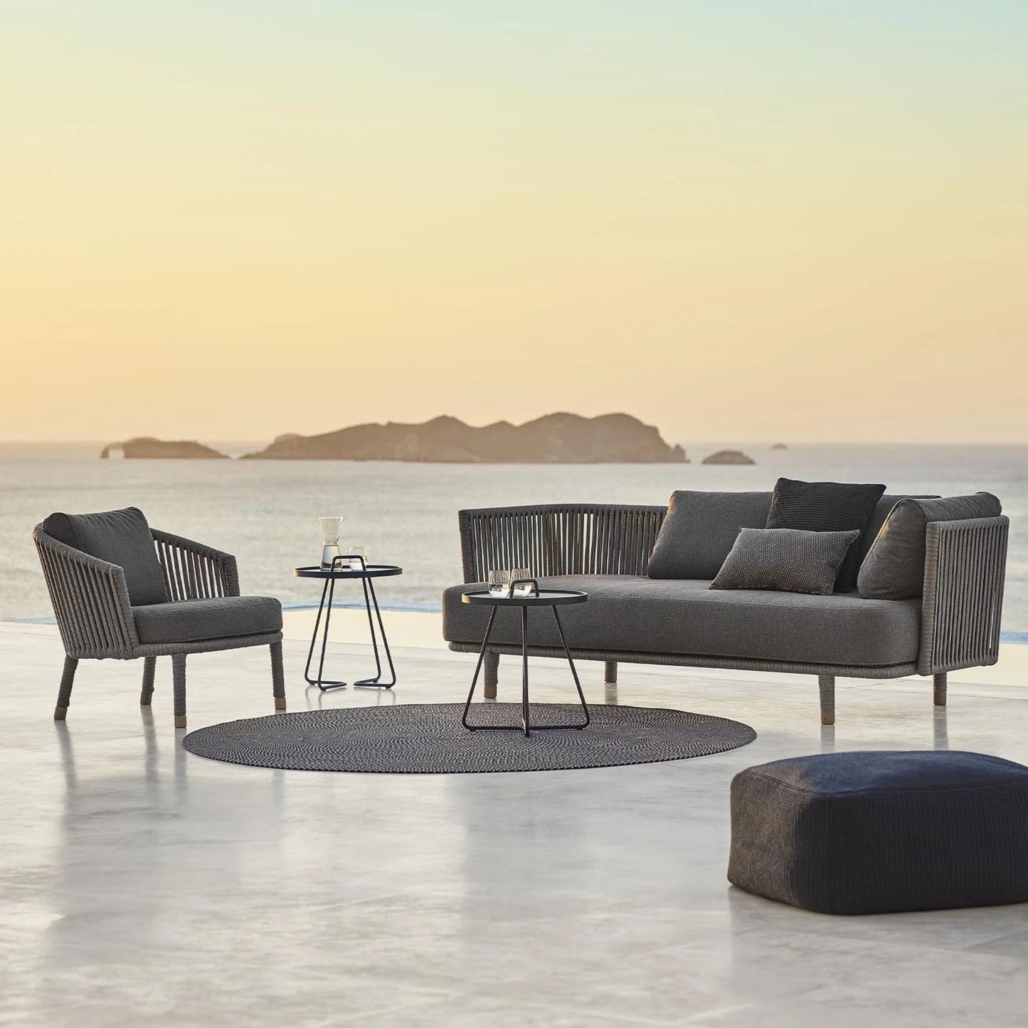 7443ROGAITG_7 outdoor furniture set on patio with ocean view