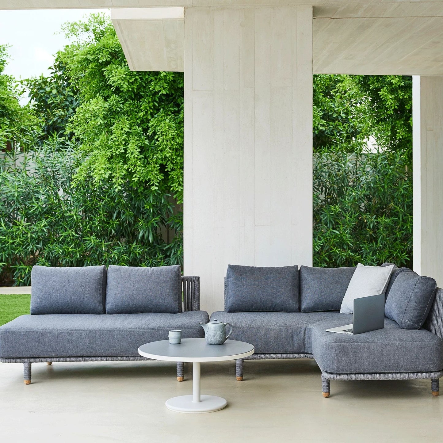 7540ROGAITG_2 outdoor sectional sofa set with table and laptop