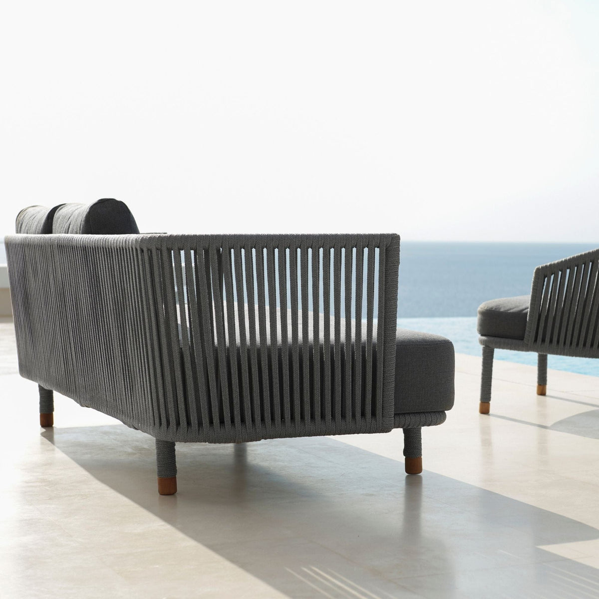 7542ROGAITG outdoor gray rope sofa and chair