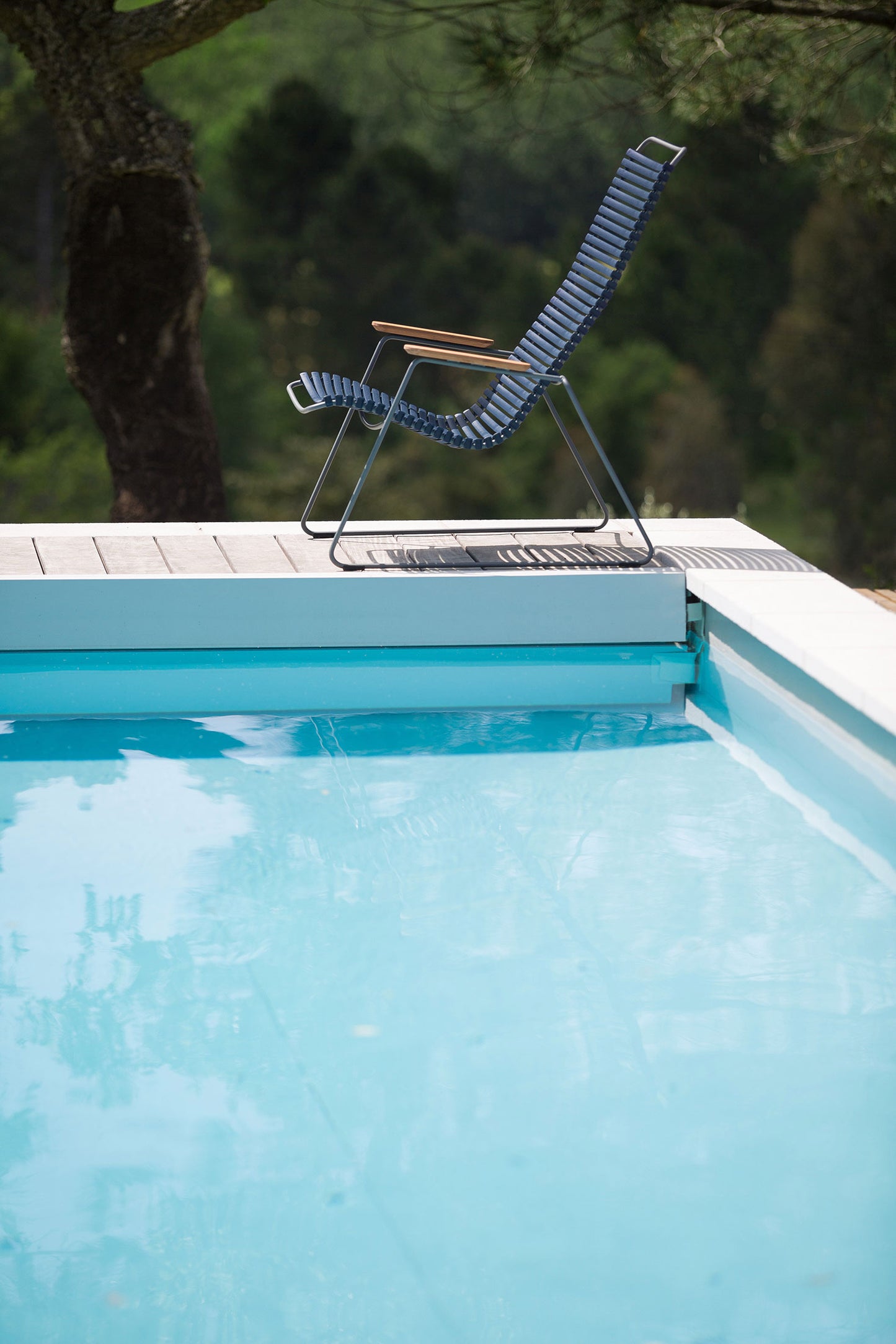 HOUE CLICK Lounge chair by pool