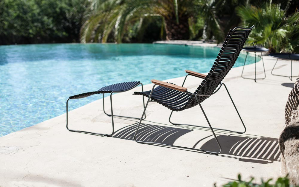 CLICK Lounge Chair w/ footrest in black by HOUE poolside