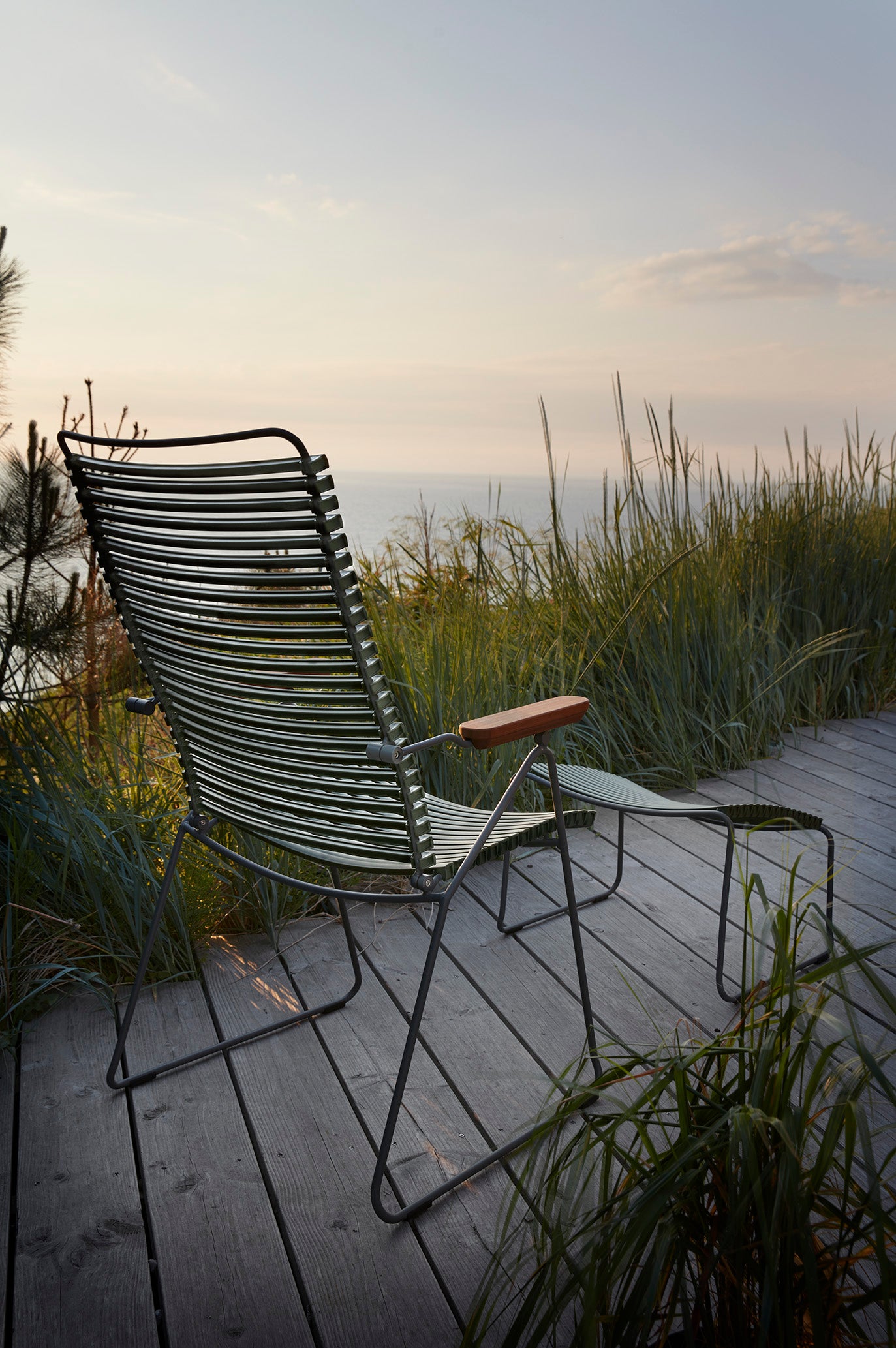 HOUE CLICK Position chair with footrest, olive green, outdoor view.
