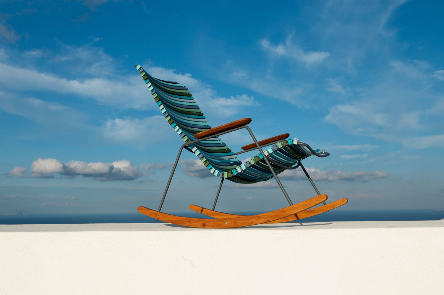 Rocking chair with blue sky view
