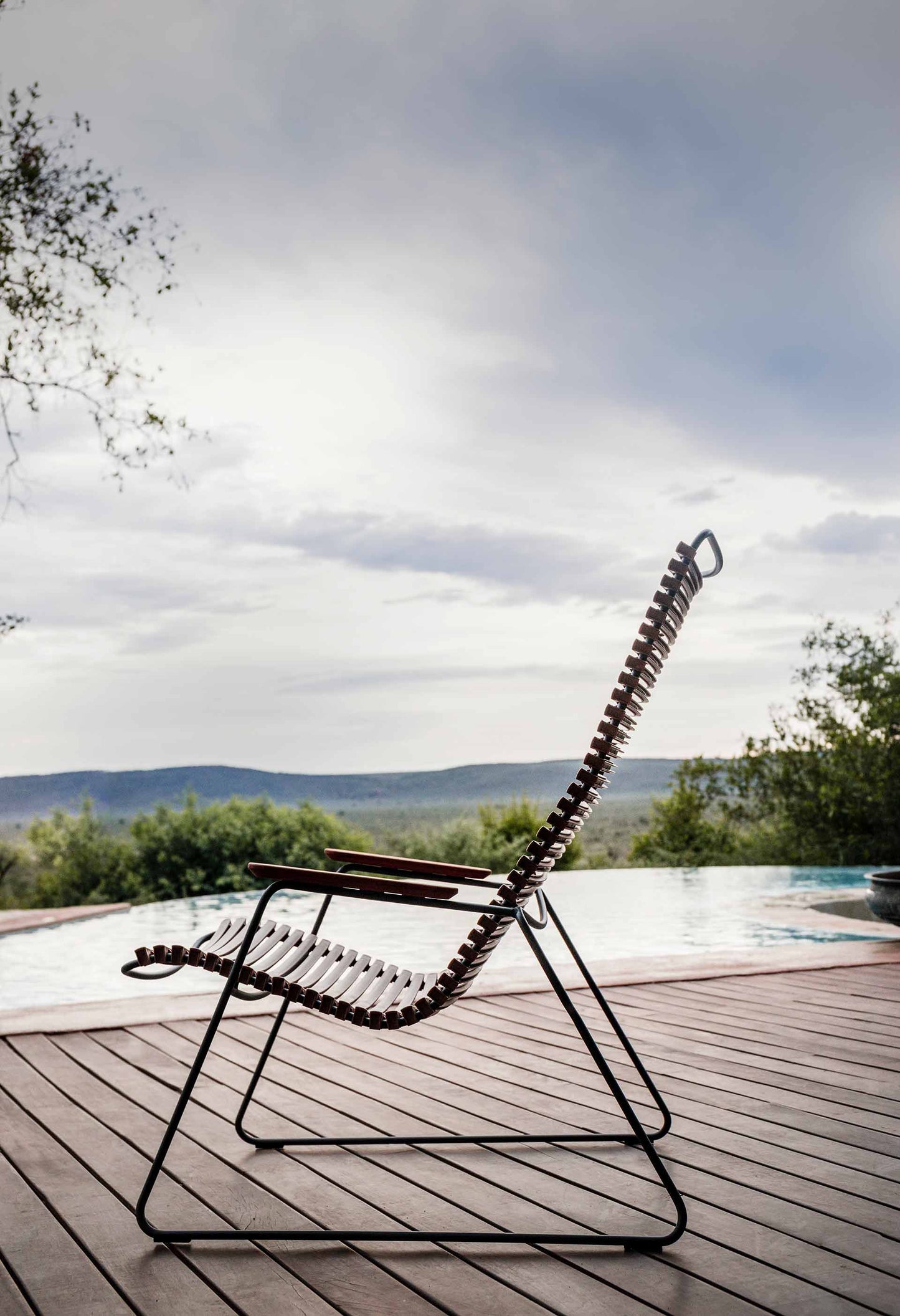 CLICK lounge chair, black HOUE 398-1SB, on wooden deck
