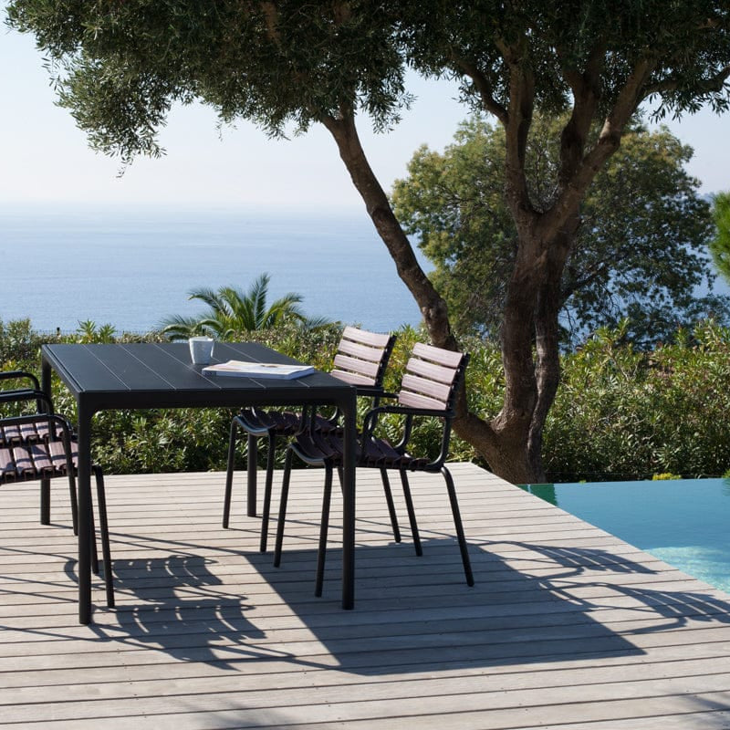 Black outdoor dining set with four chairs
