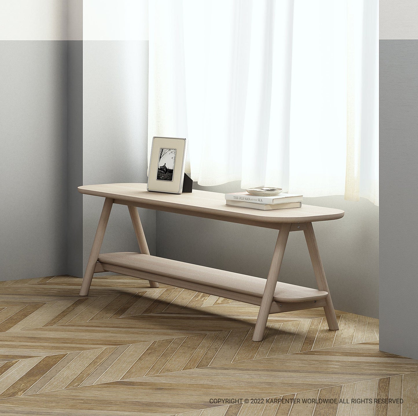 Curbus Media Rack with books and photo frame on wooden bench.