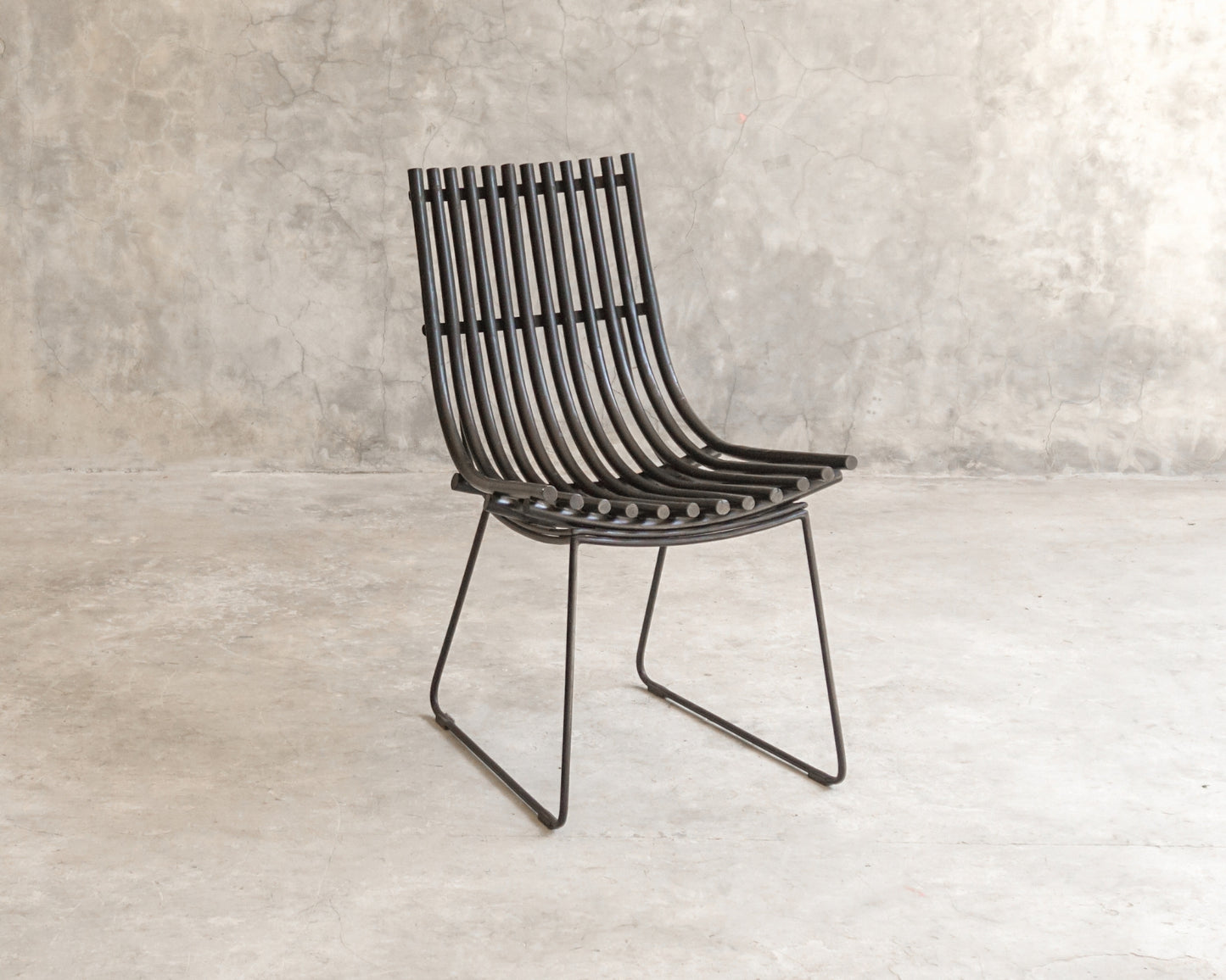 Black metal slatted chair