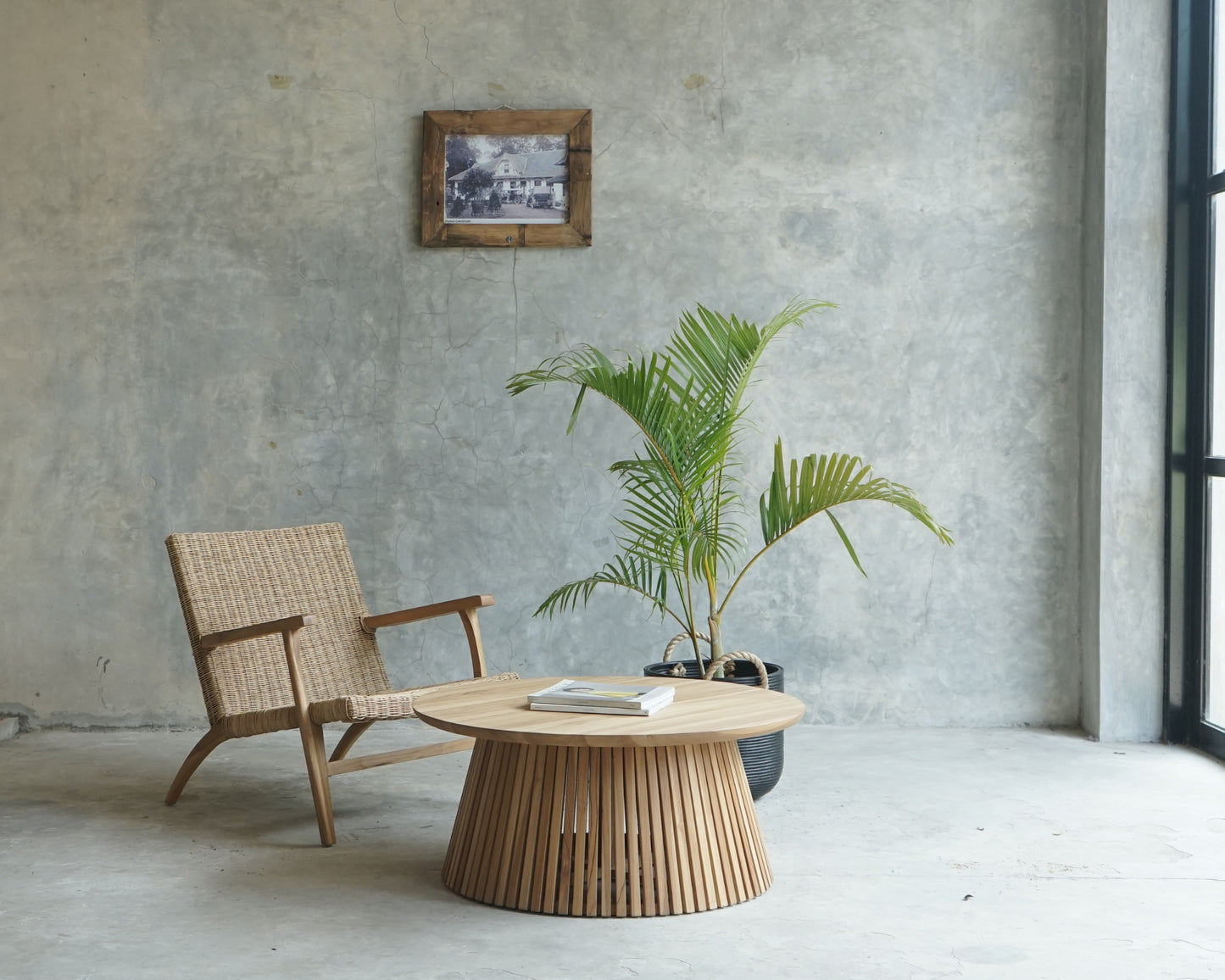 Modern interior with chair, table, and plant - ELE106_6