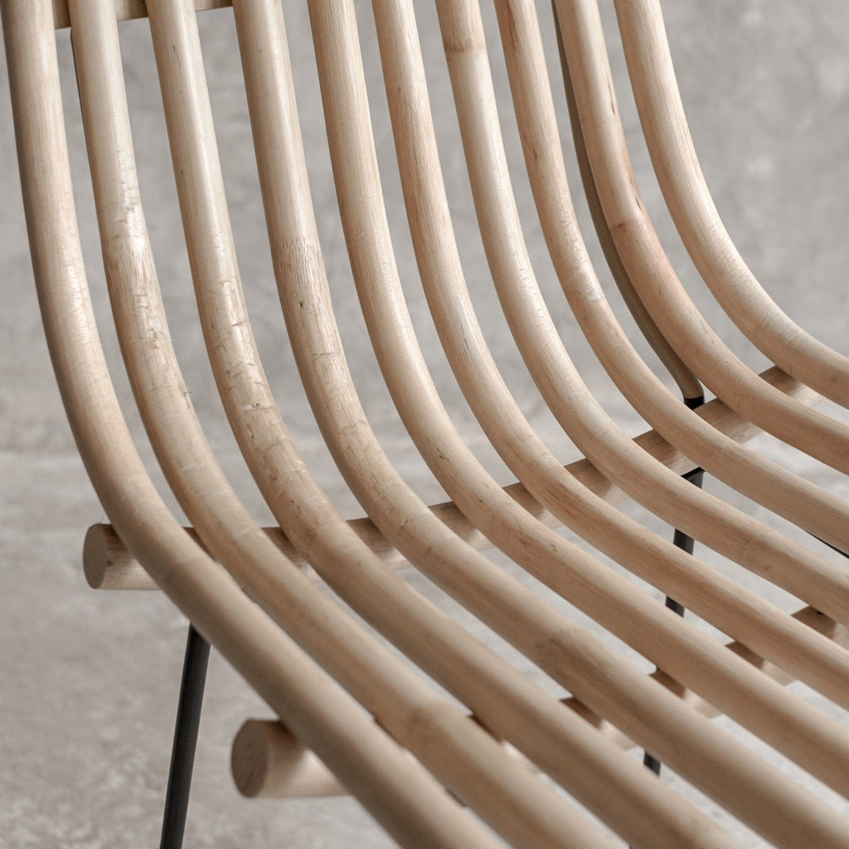 Close-up of curved wooden chair back