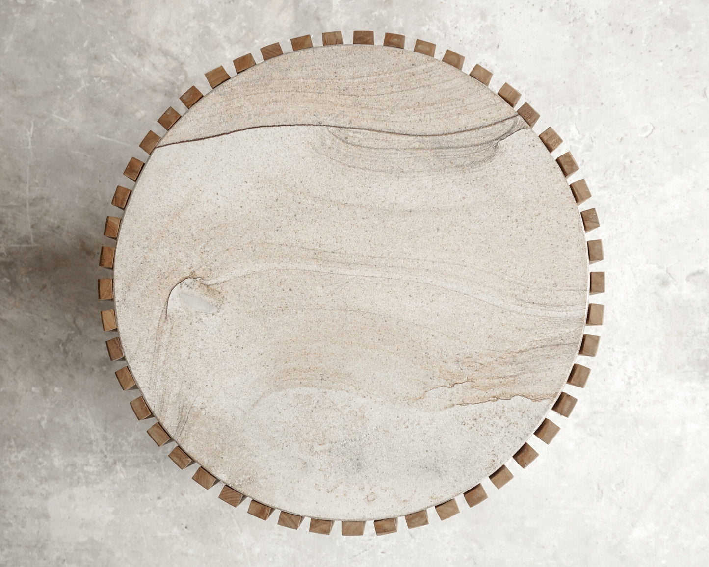 Round wooden side table with decorative edge