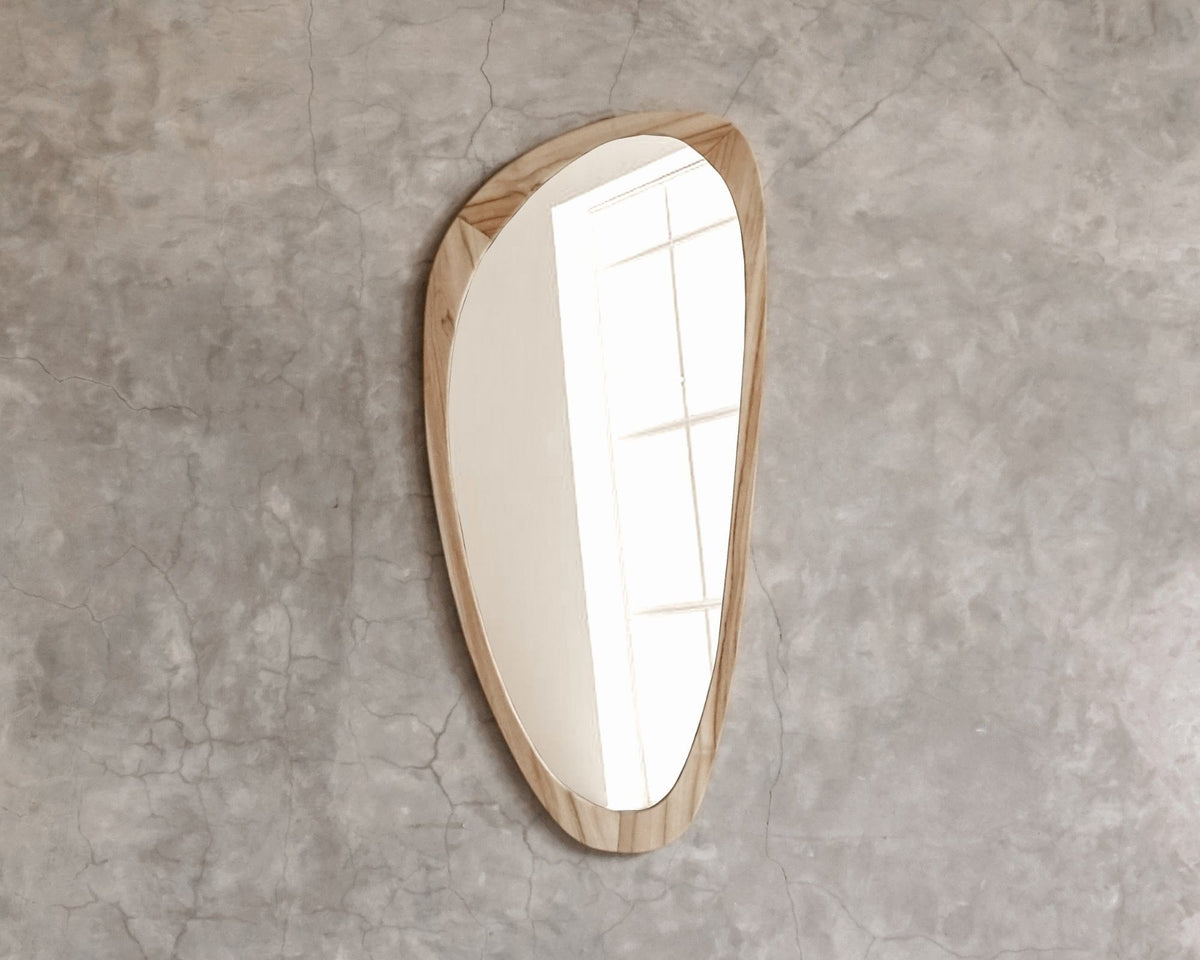 ELE122_3 Modern wooden framed mirror on a concrete wall