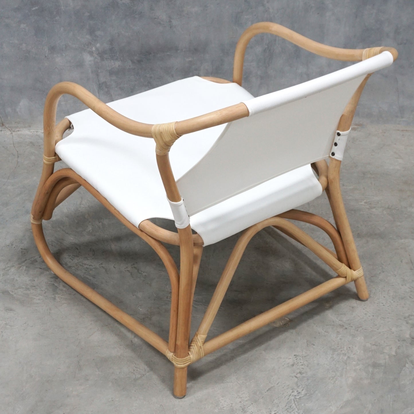 White canvas and rattan chair