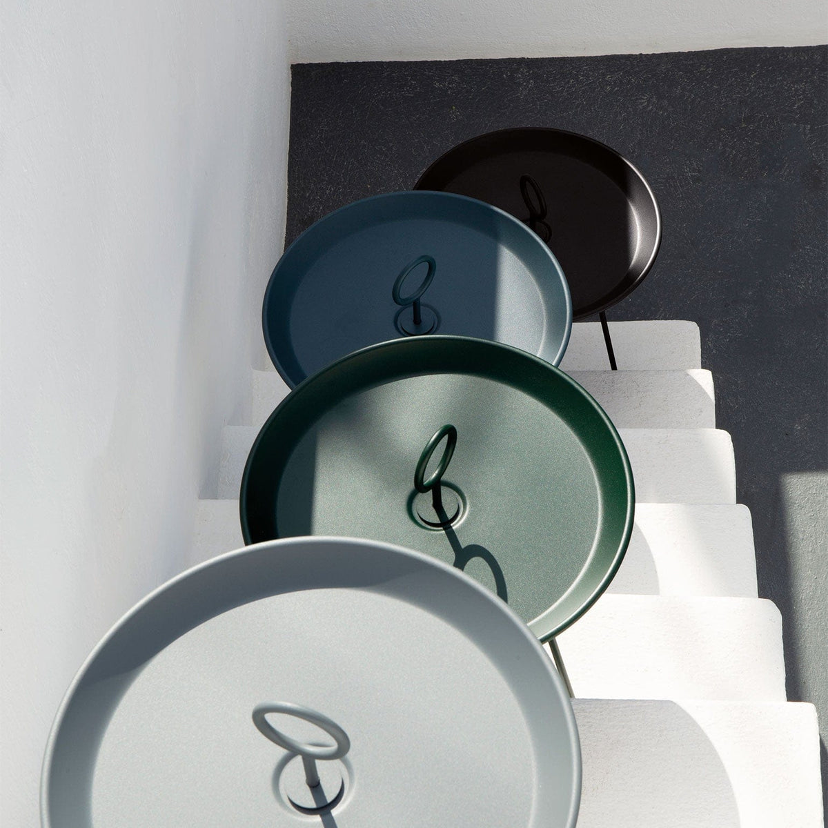 EYELET 4-color HOUE trays on stairs