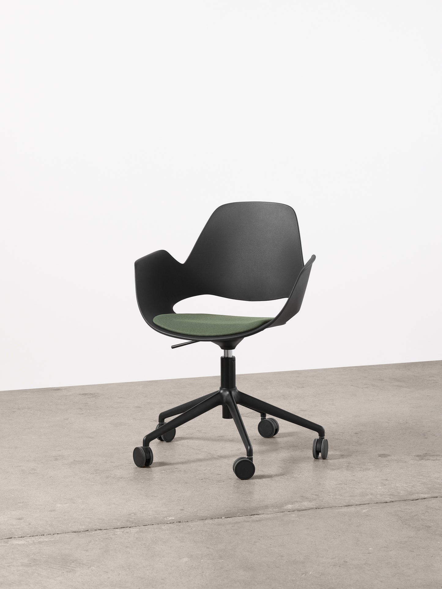 FALK Chair with castors, dark green upholstered seat by HOUE