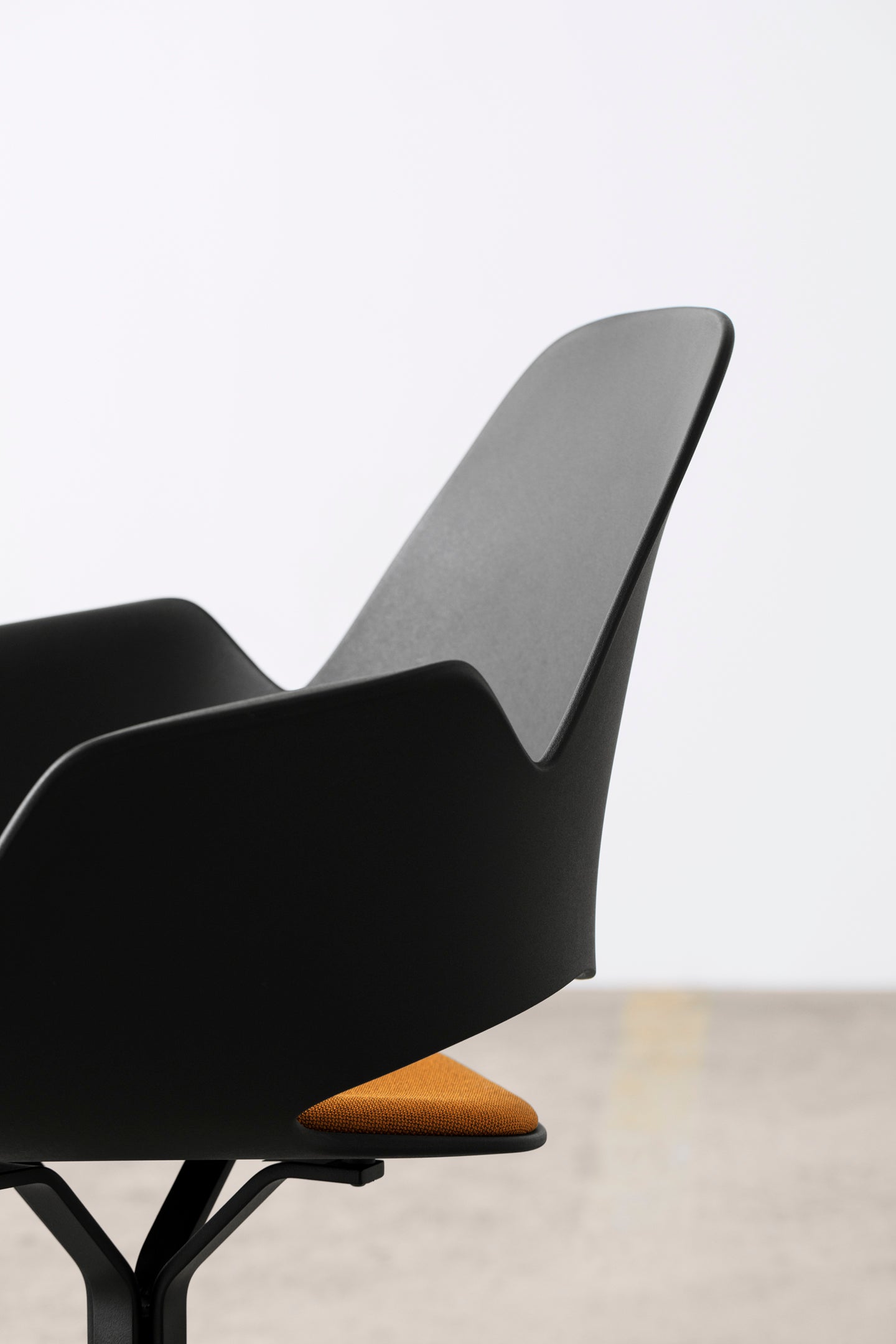 HOUE FALK chair closeup, dark yellow seat
