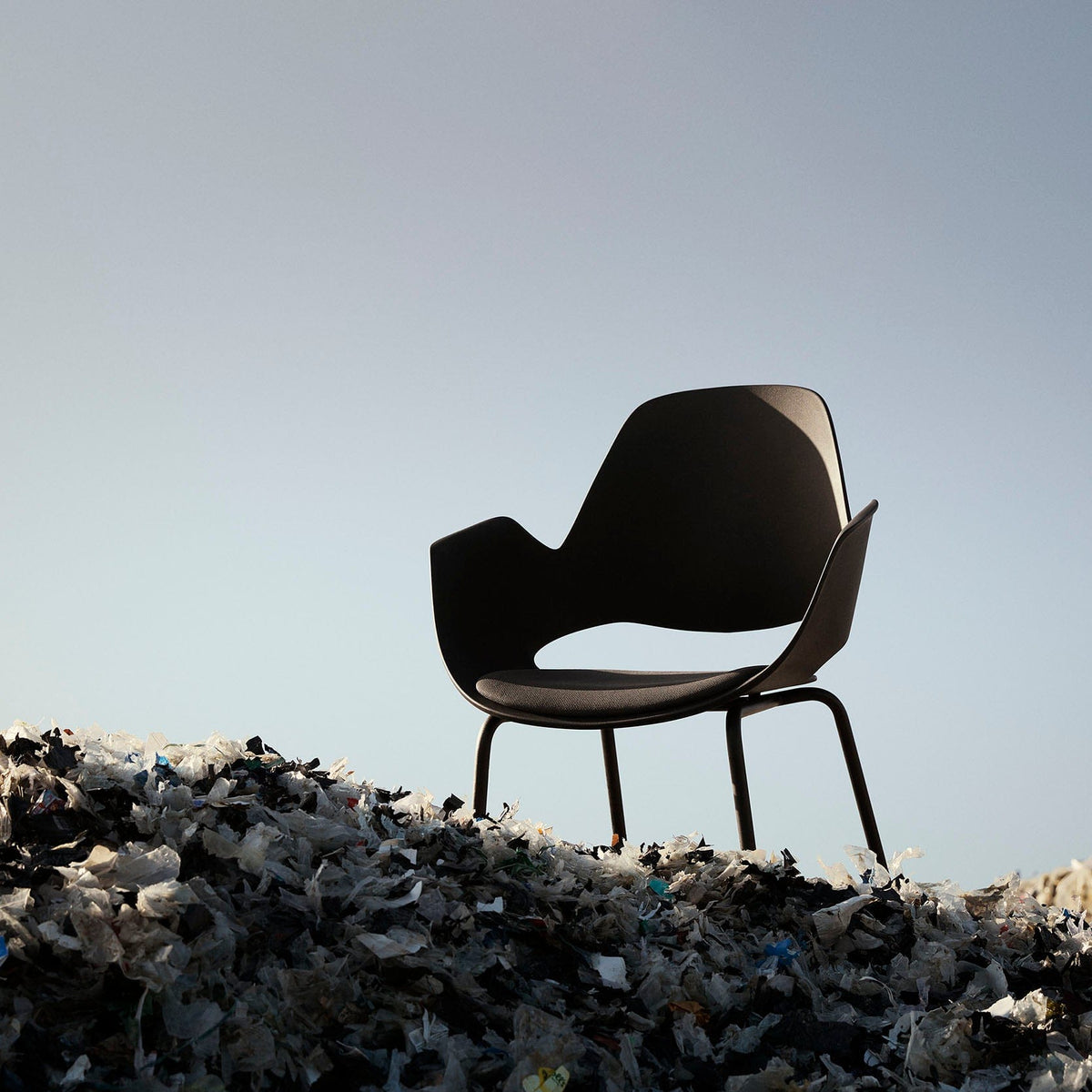 HOUE FALK chair on trash pile