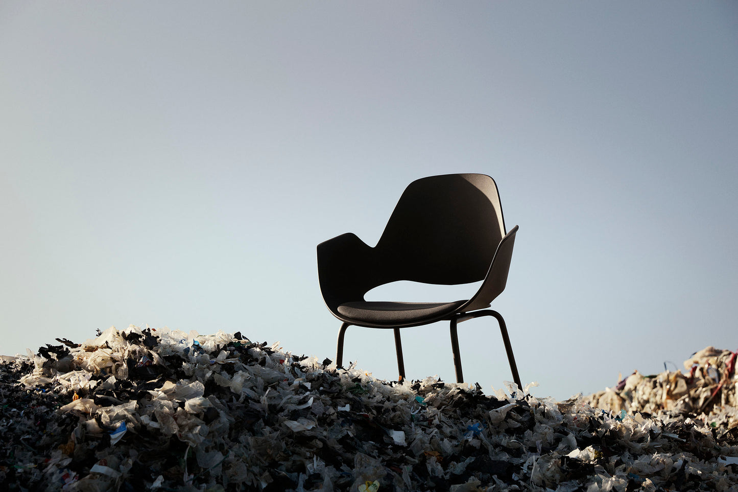 HOUE FALK chair on trash pile