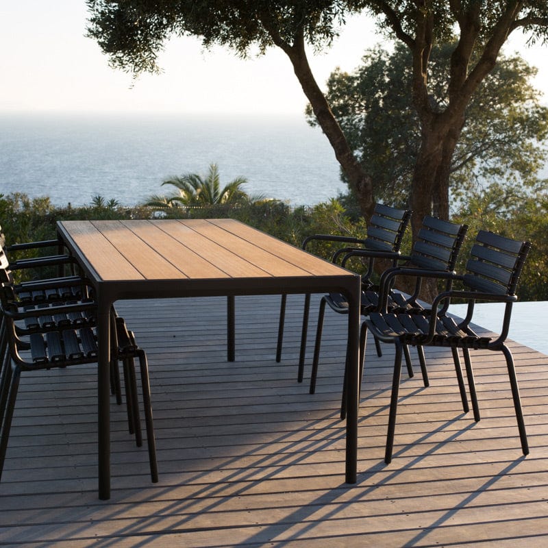 bamboo table & black chairs
