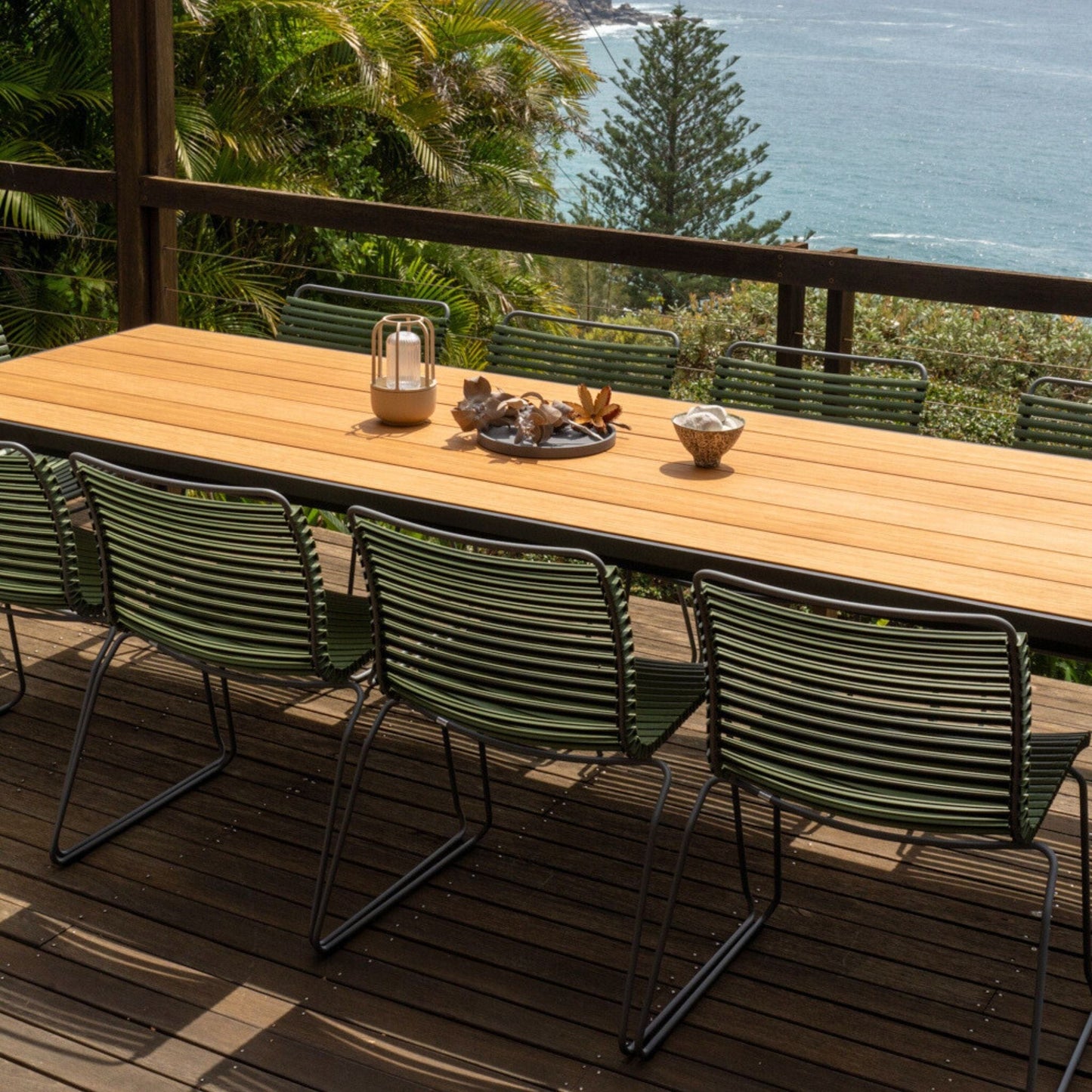 GreenClickFour Dining Set on deck with ocean view
