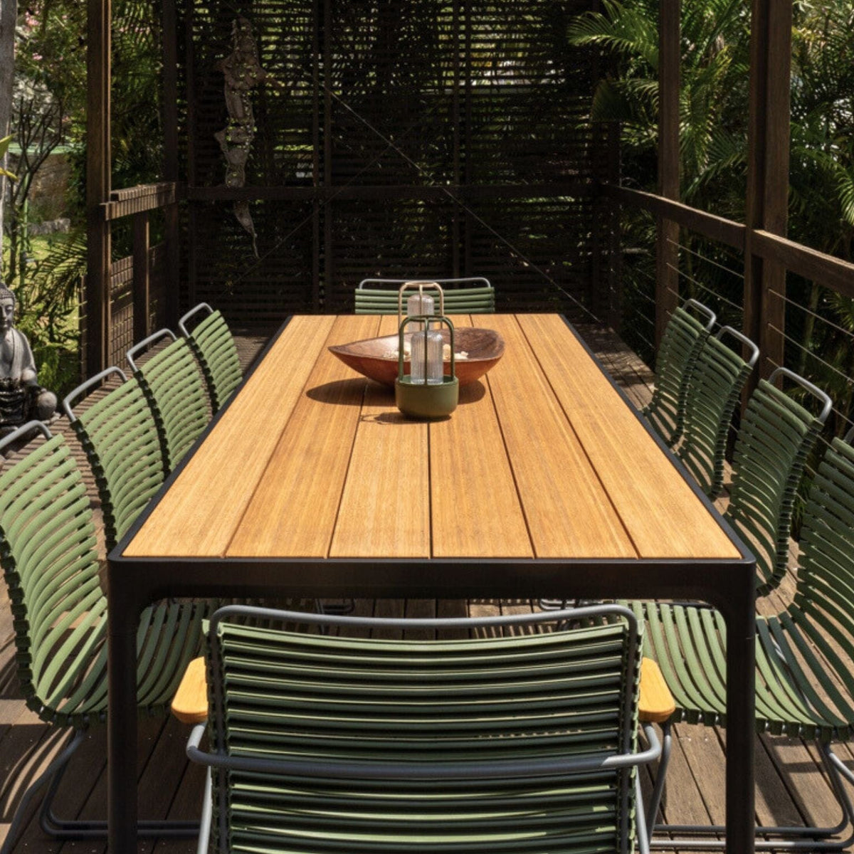 GreenClickFour Dining Set with eight chairs on deck