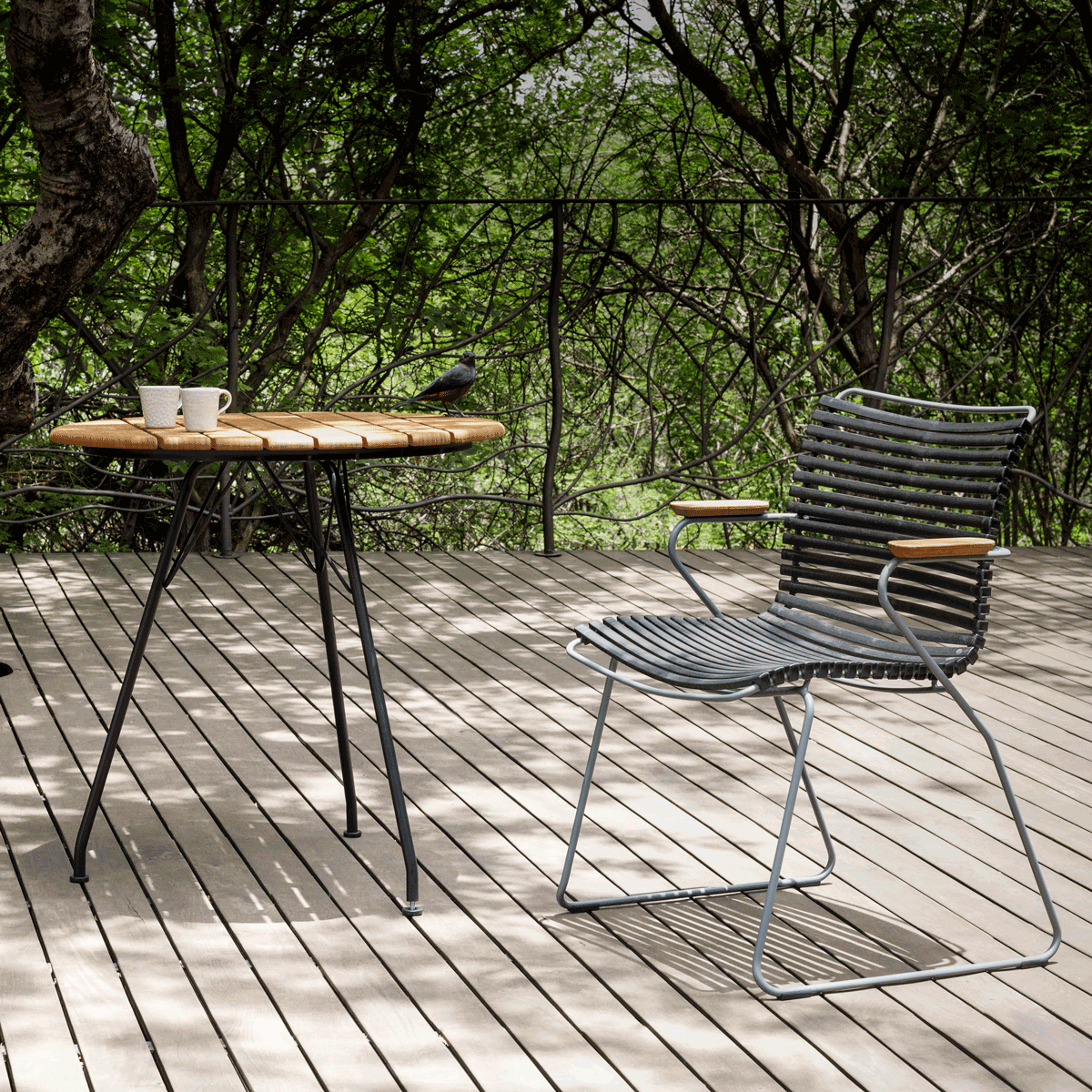 Grey Click chair and table on deck