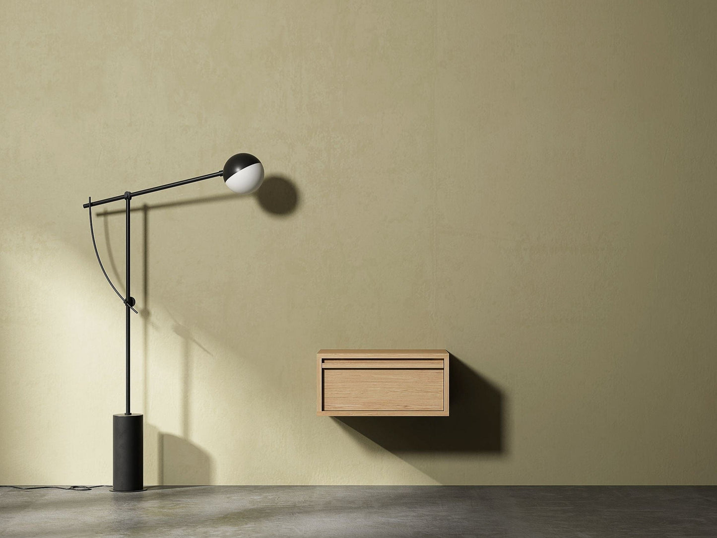 Modern lamp and wooden bedside table against olive wall