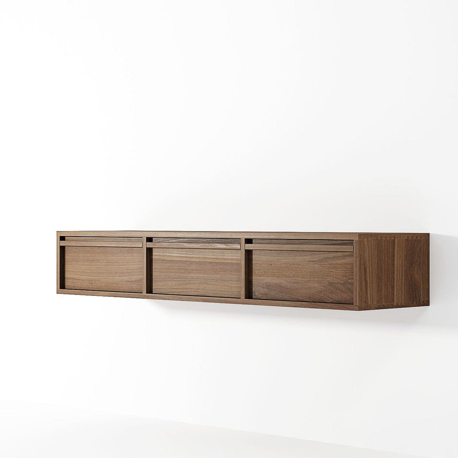 Modern wooden wall shelf with three drawers