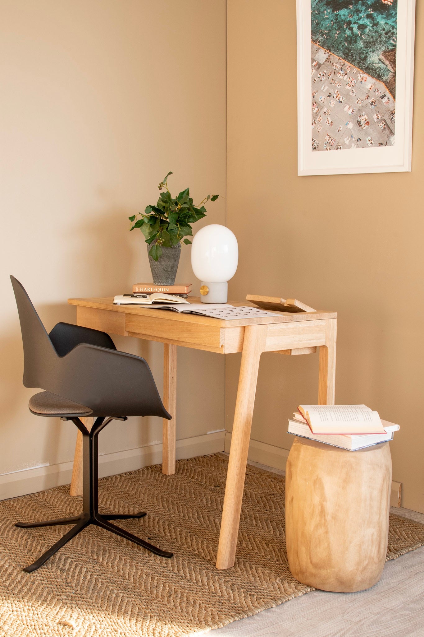 Desk setup with chair, plant, lamp, books, and KCC01O_05