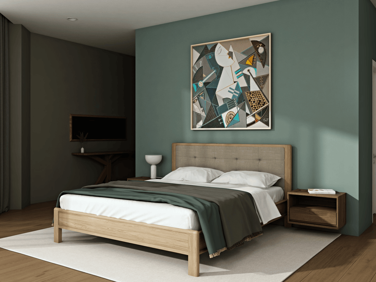 Modern bedroom with bed, artwork, and nightstand.