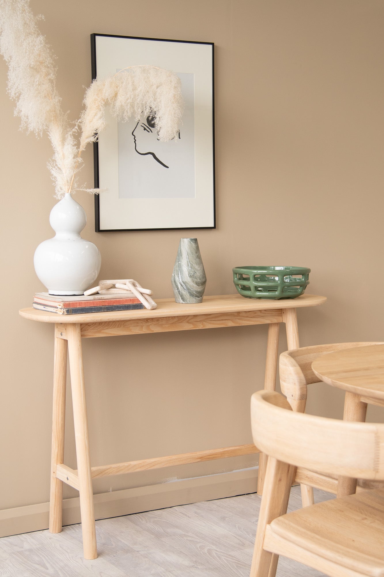 Wooden console table with decor & artwork