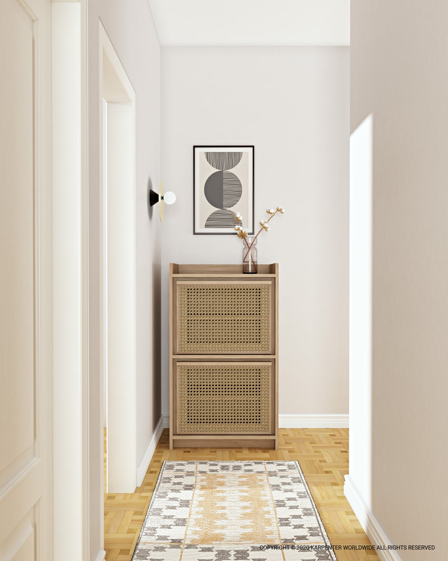 hallway with woven cabinet, art, and patterned rug