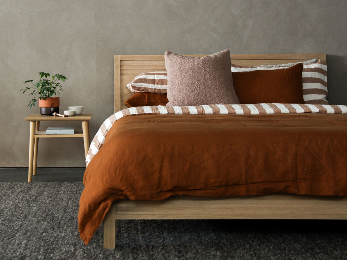 KSD011O - Brown linen bedding set on wooden bed frame