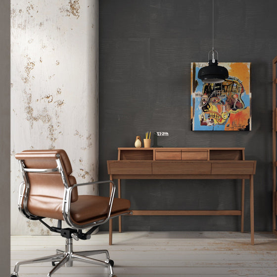 Modern desk with leather chair and abstract art