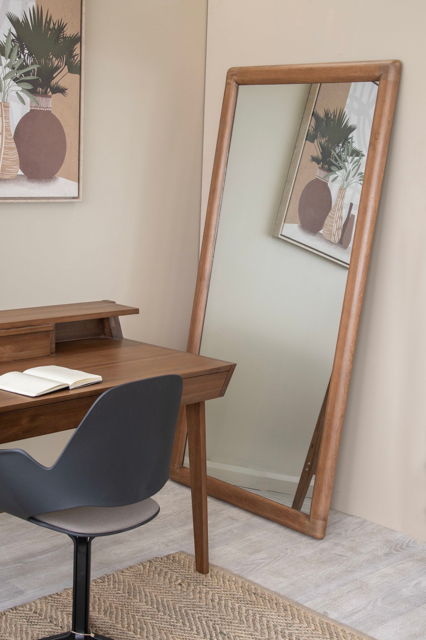 Full-length wooden mirror next to desk
