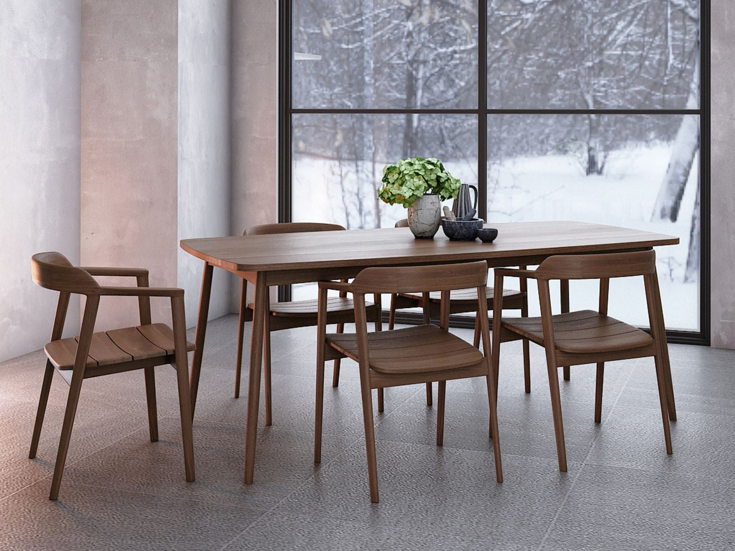 Wooden dining table and chairs with a winter view.