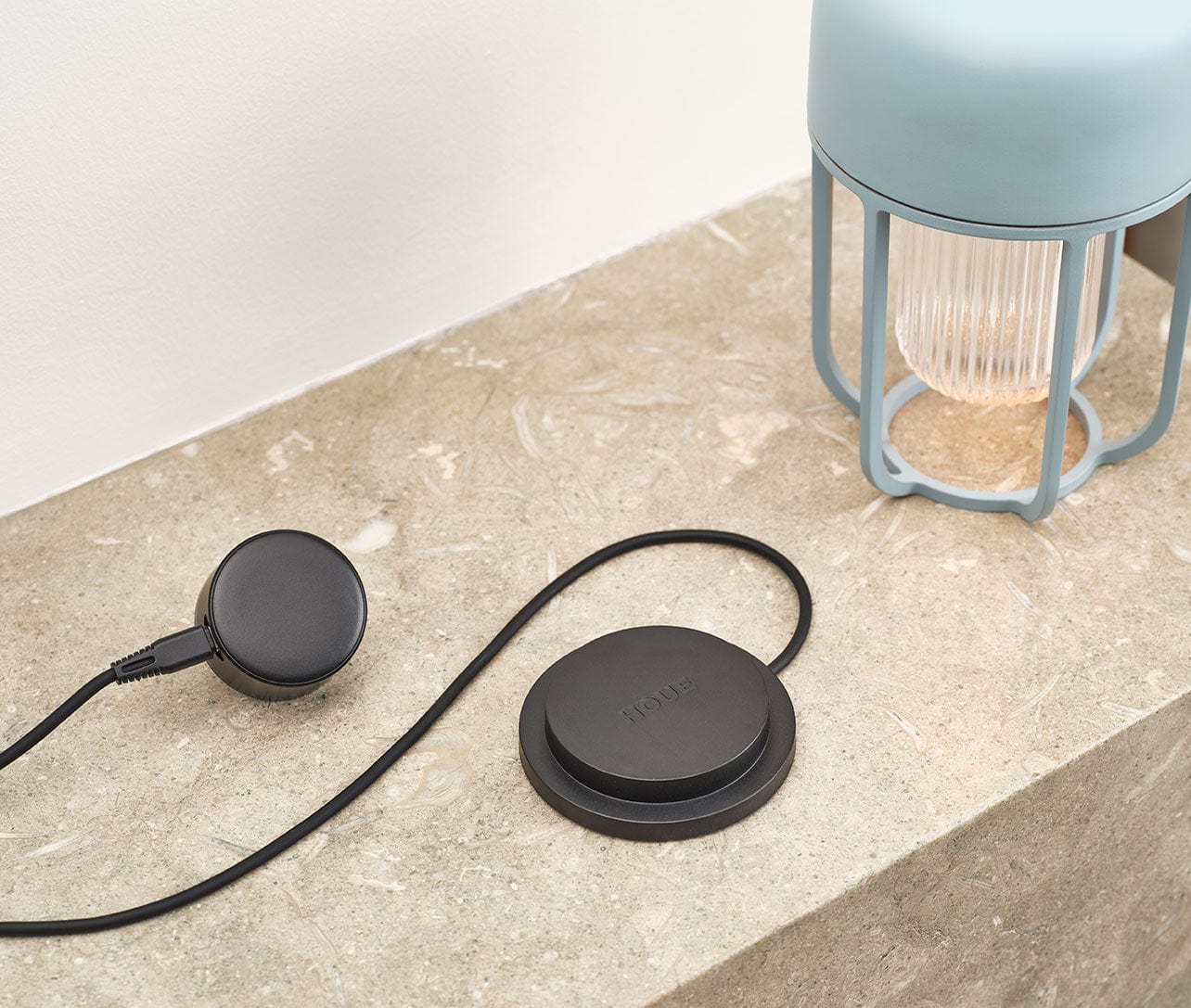 HOUE Ice Blue charger with lamp on countertop