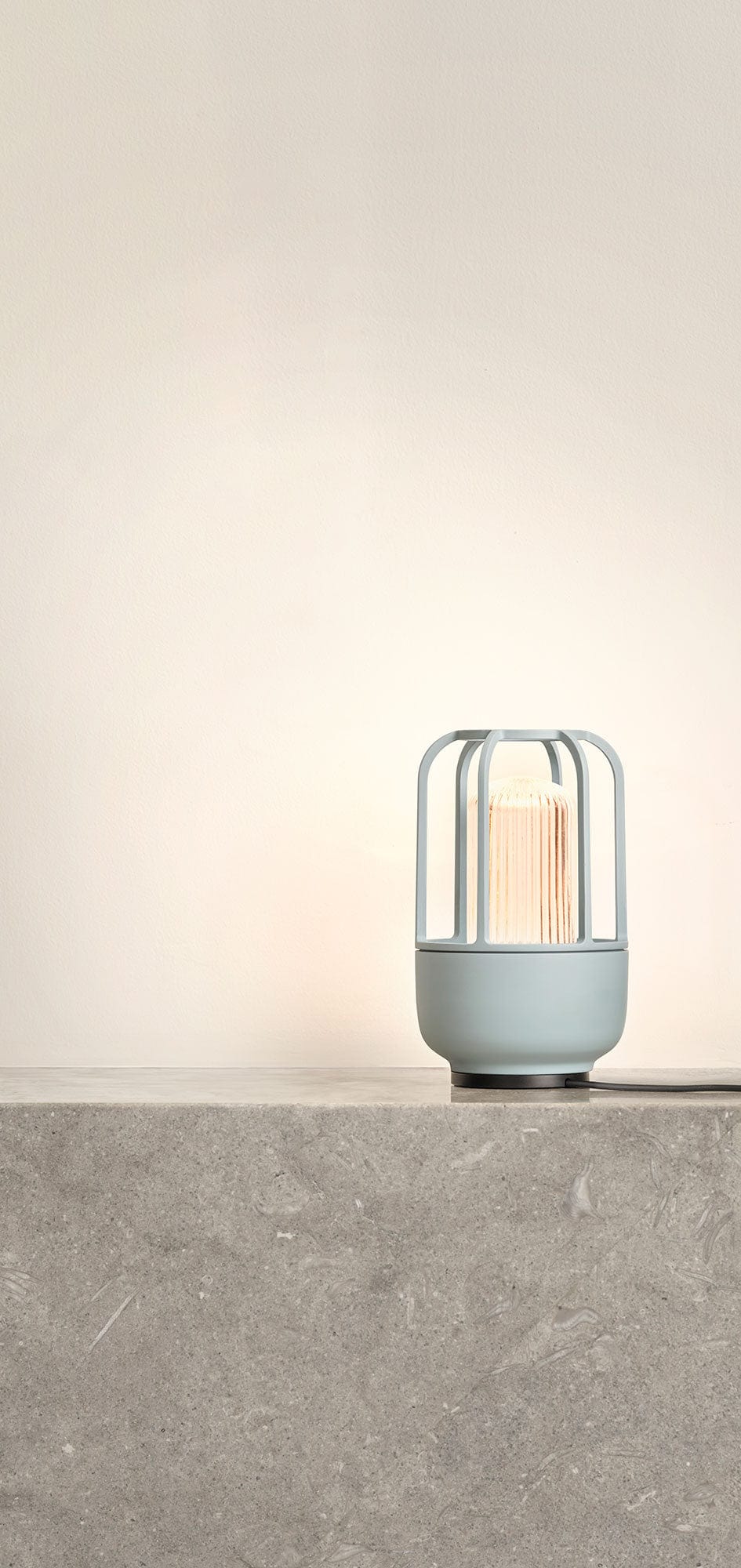 Ice blue charging light on stone surface