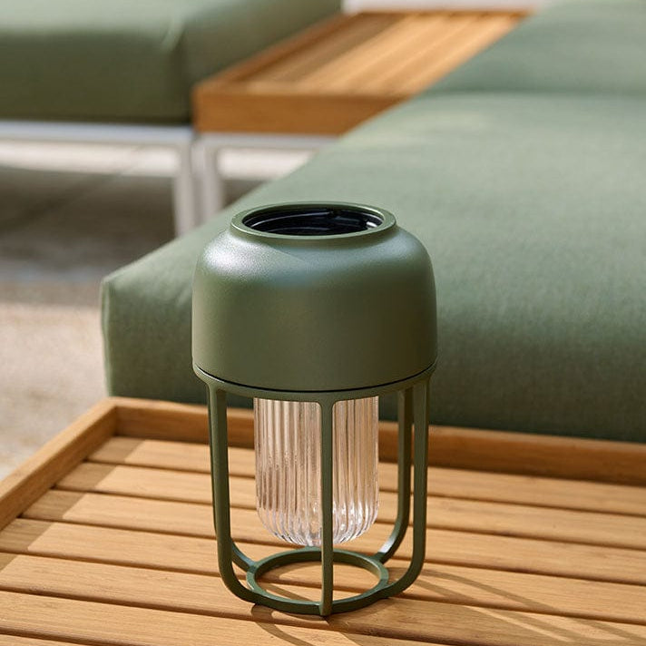 Olive green outdoor lantern on LEVEL2.