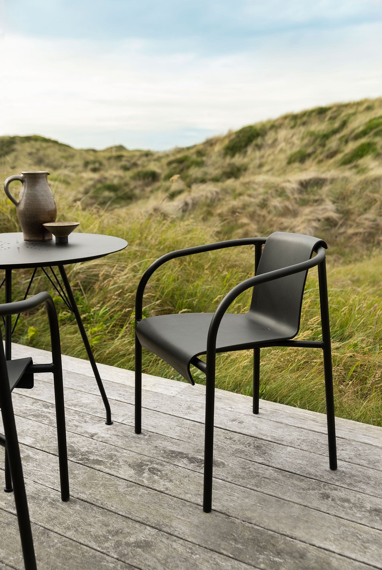 Black HOUE NAMI dining chair with armrest